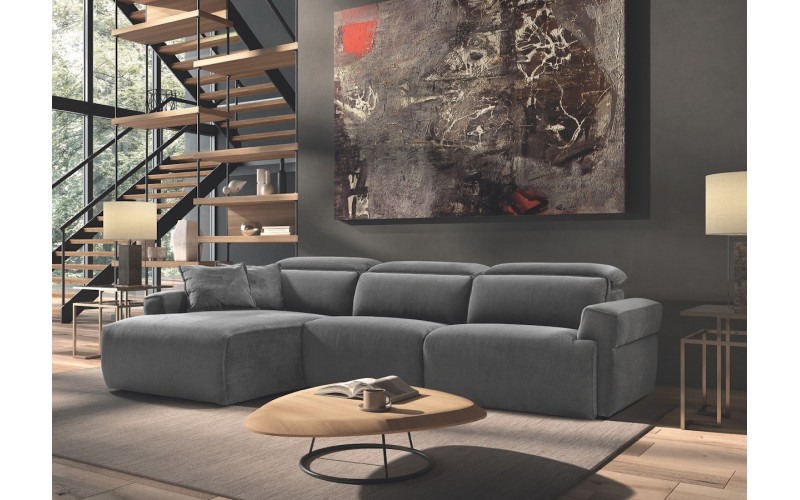 Sofá desenfundable con chasielongue moderno modelo Trevi con asientos de relax eléctricos con diseño minimalista de Pedro Ortiz