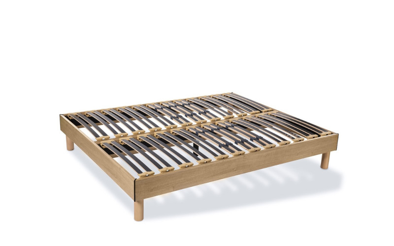 Somier de láminas Fiter con madera de haya y reguladores de firmeza para un descanso estable y confortable.